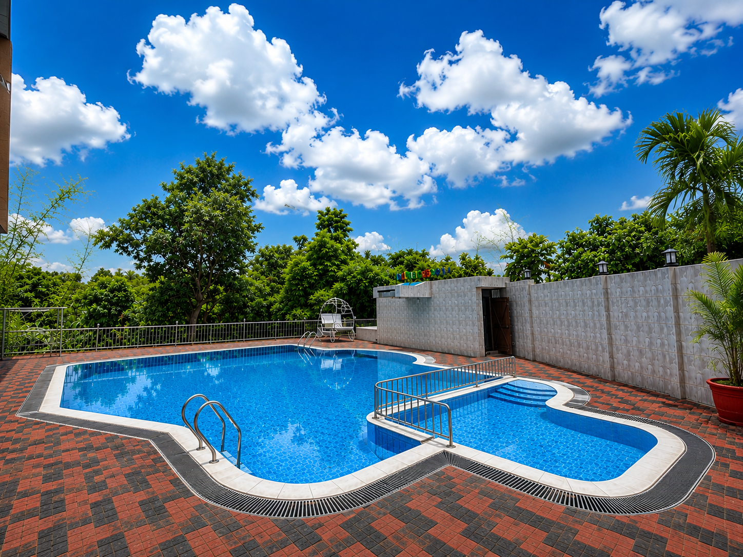 Swimming pool at SKD Amar Bari Resort