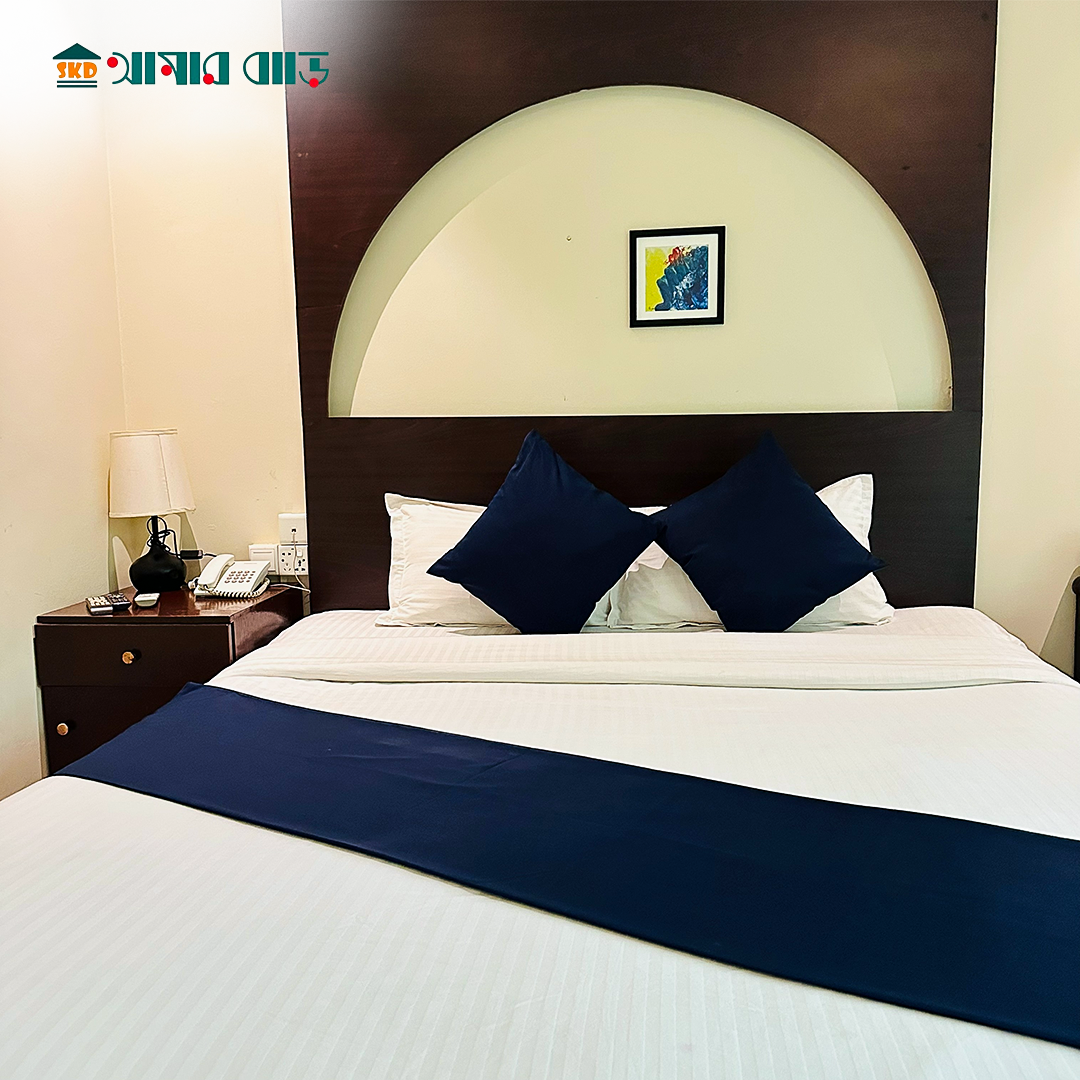 King Couple Deluxe room overlooking the resort's green surroundings